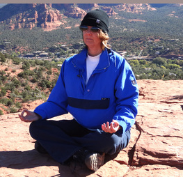 Peggy Steffens meditating in Sedona at Airport Mesa Vortex